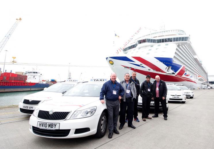Proud Southampton Taxi Drivers with Cruise Ship Britannia